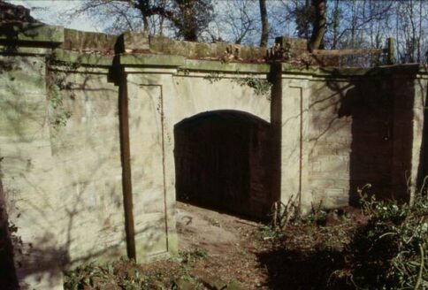 An old stone archway with colunmns, that previously ran below the Great Western Canal.
